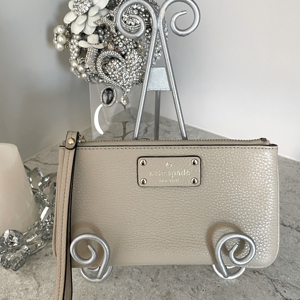 Coach taupe wristlet.